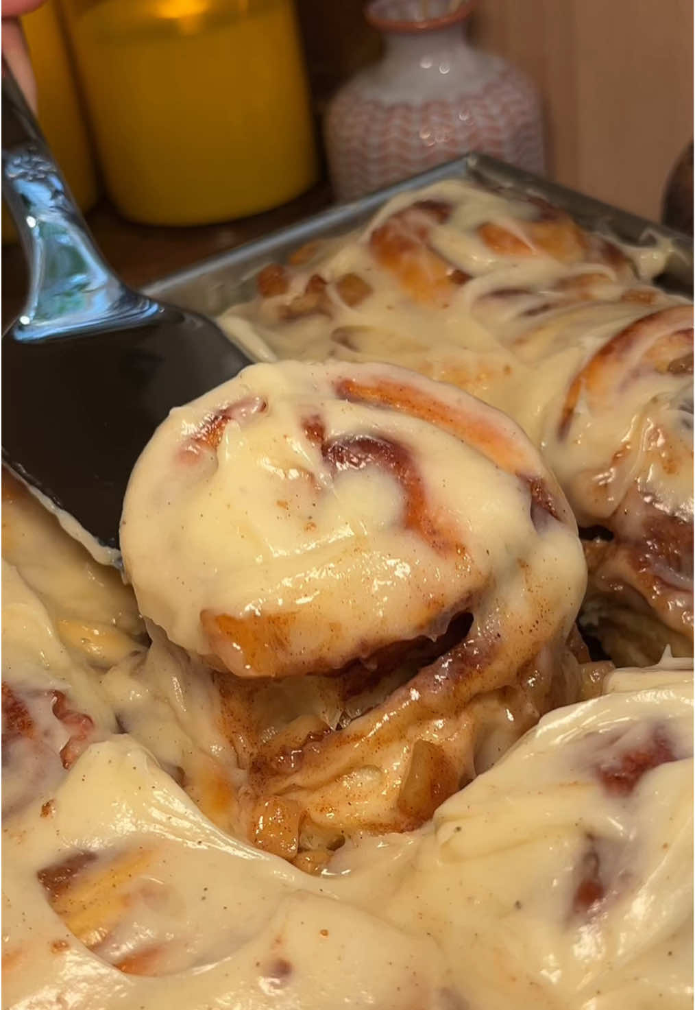 Apple pie cinnamon rolls 🍎 When apple pie meets cinnamon rolls. These might be the SOFTEST cinnamon rolls i’ve made yet. Seriously so good when served warm!! After being stored in the fridge, simply microwave for 30 seconds :)  Makes 9 rolls in a 8x8 inch square pan For the Apple Pie Filling/Topping (USE ONLY 400g for the cinnamon roll filling. And the remainder as a topping after the rolls are baked): * 650g apples (about 3-4 apples), peel cored and small diced * 3 tbsp butter  * Juice of 1 lemon  * 110g brown sugar, packed  * 1/4 tsp salt * 2 teaspoon cinnamon * Cornstarch slurry: 2 1/2 tsp cornstarch plus 2 1/2 tsp water For the Dough * 180g milk whole is best * 1 1/8 teaspoons (6 grams) active dry yeast  * 1 teaspoon honey * 1 large egg * 1 large egg yolk * 75g sugar * ½ teaspoon salt * 410g bread flour plus extra for kneading and rolling * 60g unsalted butter, softened  For the Cinnamon Sugar Filling:  * 64g Unsalted butter, softened * 95g Brown sugar * 2 tsp Ground cinnamon * 1/8 tsp Ground nutmeg ***3 tbsp heavy cream (for pouring over the rolls. It is optional)  Cinnamon Cream Cheese Icing: * 56g unsalted butter, room temperature  * 4 oz cream cheese, room temperature * 1/2 tsp cinnamon  * 2-4 tbsp heavy cream or milk * 100g icing sugar  After the rolls have proofed and is doubled it size, pour the heavy cream over the rolls. Then bake at 350 for 28-35 minutes or until golden brown all around. Or until the internal temperature reaches at or above 190F. Serve warm and top with remaining apple pie filling. Or even serve with vanilla bean ice cream!!  #applepie #cinnamonroll #fallbaking #bakingtiktok #bakingrecipe