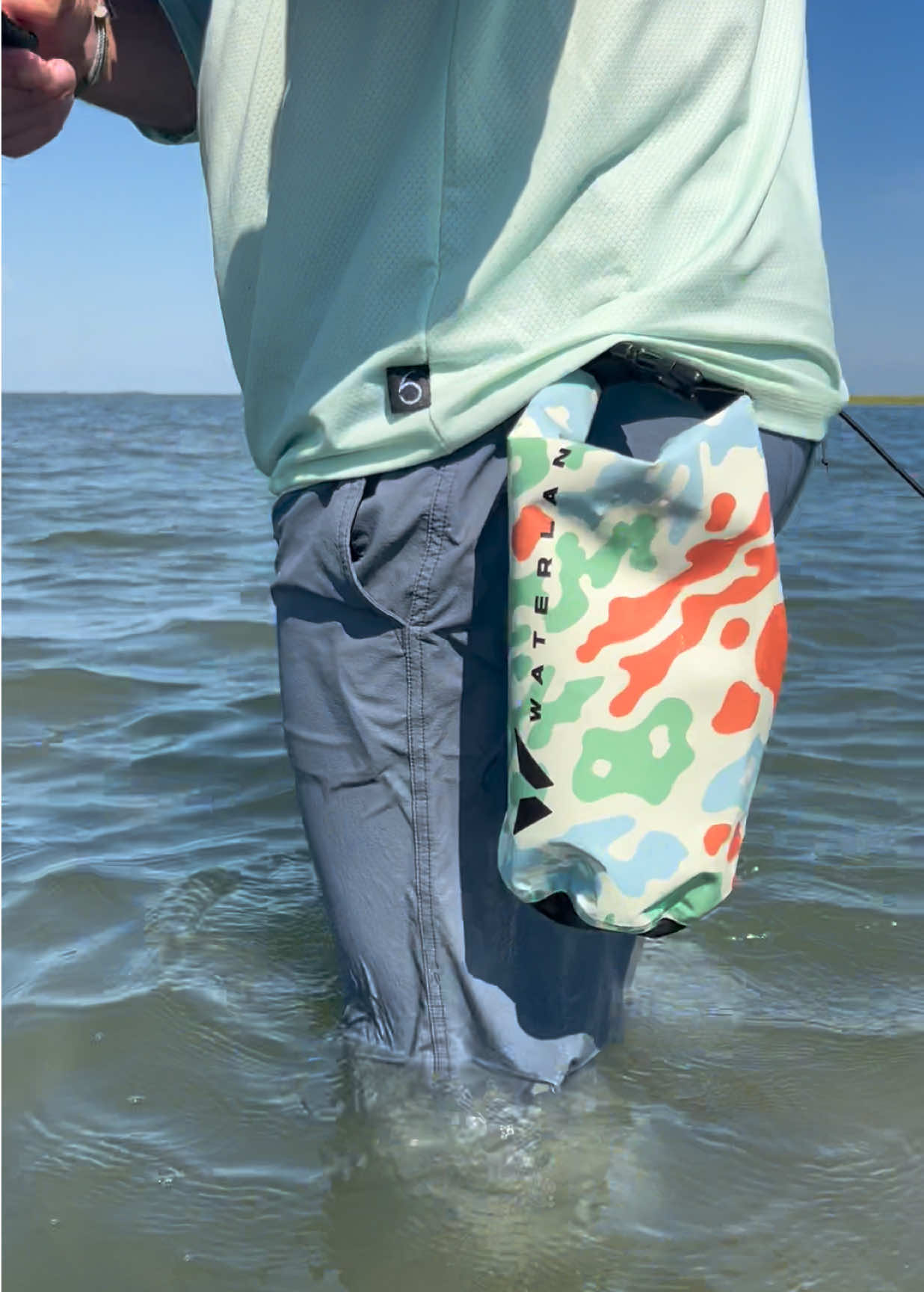 Built to protect against choppy water, salt spray, and everything in between. The DryLand Bag keeps your keeps your essentials dry so you can focus on what really matters. Easy protection for the everyday grind. #waterlandco #waterlandsunglasses #fishinggear #fishing #fyp 