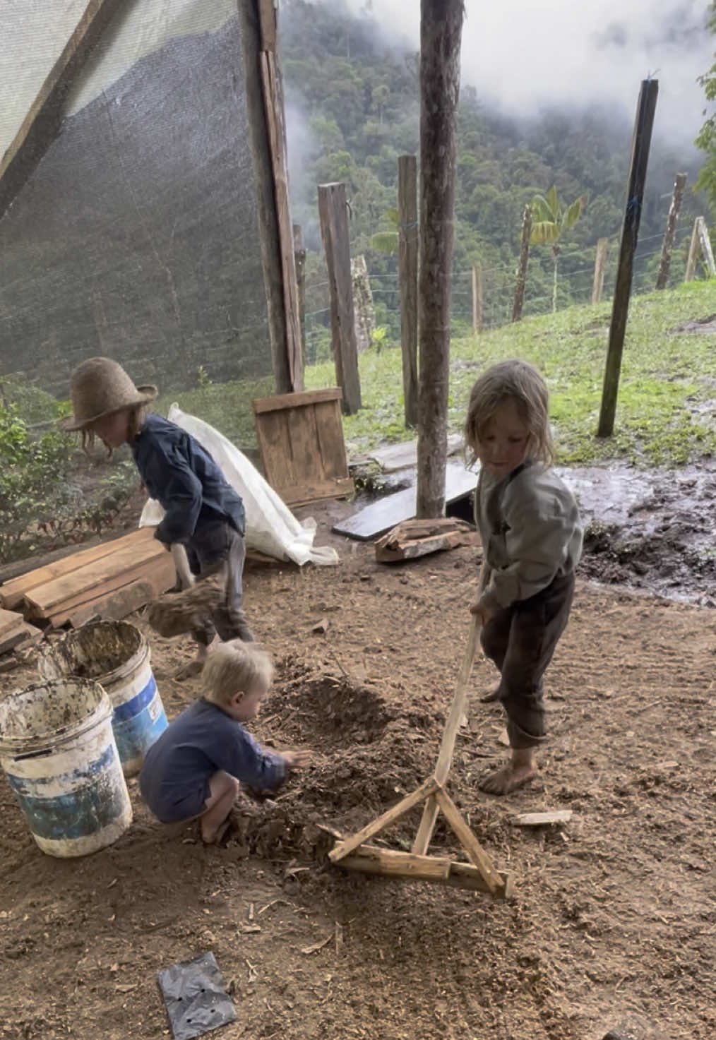 Boys trying out take loading buckets #offgrid #homesteading #rakeing 