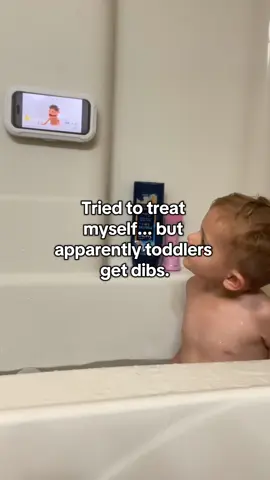 Reality of motherhood:  I stepped in he bath, and right back out so he could play.