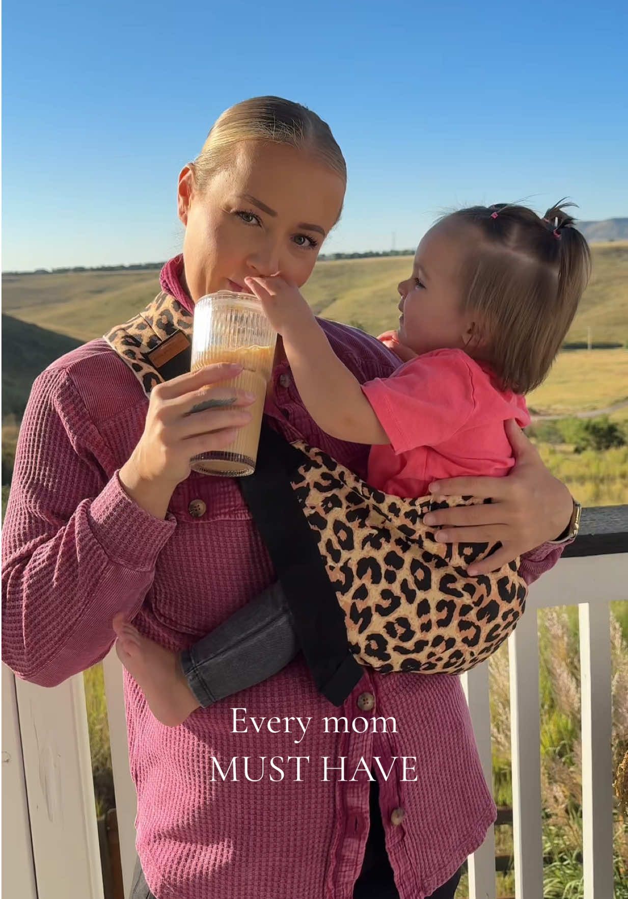 Drinking morning coffee with my bestie is so much easier now! This baby sling carrier is a lifesaver and every moms must have! #babycarrier #babymusthaves #babyproducts #babyessentials #babywearing 