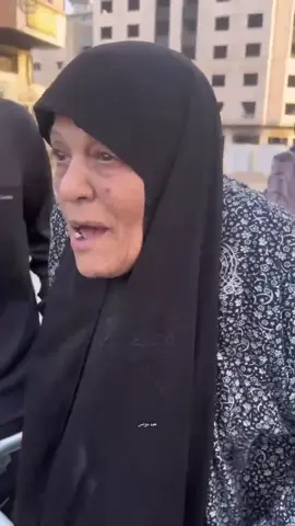 ‏An elderly woman emerges from her home, compelled to flee in haste so that the occupation can bomb her house, amid the targeting of dozens of towers, buildings, and residential structures in Gaza City.   ‏#Gaza_Under_Bombardment ‏امرأة مسنة تخرج من بيتها مرغمة على وجه السرعة، كي يقصف الاحتـلال بيتها، في ظل استهداف عشرات الأبراج والعمارات والبنايات السكنية بمدينة غزة.. ‏⁧‫#غزة_تحت_القصف‬⁩