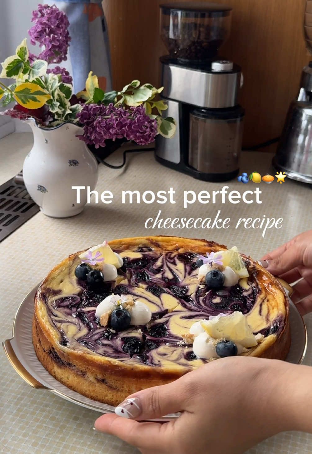 Blueberry Lemon Swirl Cheesecake [repost]🍋🫐🥧 My top dessert this summer definitely was this creamy cheesecake that i made for my bf’s birthday! It’s creamy, and has the fresh and tangly taste from the lemon and homemade blueberry compote🥹 Recipe: Graham Cracker Crust: 13/4 cups graham cracker crumbs (200 grams) 1/3 cup granulated sugar (66 gams) 8 tablespoons unsalted butter melted (113 grams) Berry Swirls: 1 1/4 cup blueberries fresh or frozen (188 grams) 2 tablespoons granulated sugar divided (24.7 grams) Some lemon zests Cheesecake Filling:  24 ounces cream cheese room temperature (678 grams) 3/4 cup granulated sugar (148.5 grams) 2 tablespoons all-purpose flour (7.5 grams) 2 teaspoons vanilla extract (9.3 grams) Some lemon, and orange zests 3 eggs room temperature Instructions: • preheat the oven to 325 F/ 163 C • Combine the graham cracker crumbs, sugar, and melted butter. Press into the bottom of the prepared springform pan. Bake for 6 to 8 minutes or until golden brown.  • for the compote: combine the blueberries, sugar, and 2 tablespoons water in a small saucepan over medium heat. Stir consistently, until the mixture has thickened, about 5 minutes.  • increase the temperature of the oven to 350 F/ 177 C • for the cheesecake: beat the cream cheese on medium-low, add in 3/4 cup granulated sugar and beat until combined. Add in the flour, vanilla and eggs, one at a time, beating until it is all well combined • pour 1/3 of the cream cheese batter into the cake ring then add a few spoonfuls of the compote. Keep doing this until you have nothing left • bake the cheesecake for 35 minutes. Turn the oven off and leave in the oven with the door closed for an hour. Take the cheesecake out of the oven and set it on the countertop allowing it to cool for 1 hour before moving it to the refrigerator. Refrigerate at least 4 hours before serving. #cheesecake #blueberrycheesecake #dessert #baking #lemonblueberry 