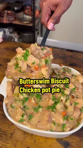 Butterswim biscuit chicken pot pie recipe ⬇️ Biscuits 2 1/2 cups flour 5 tbsp cold butter 1 1/2 tbsp baking powder 1 1/2 tsp salt 1 tbsp white sugar 2 cups milk 1 stick melted butter Chicken gravy  2 stalks of diced celery  1 diced carrot  1/2 diced onion (yellow or white works) 1 tbsp unsalted butter  1 1/2 lbs diced chicken thigh  1/2 diced russet potato Seasonings on screen  Salt to taste  #EasyRecipes #biscuits #DinnerIdeas #chickenpotpie #potpie 