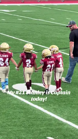 My son got to be team captain today for the coin toss! #football #teamwork #son 