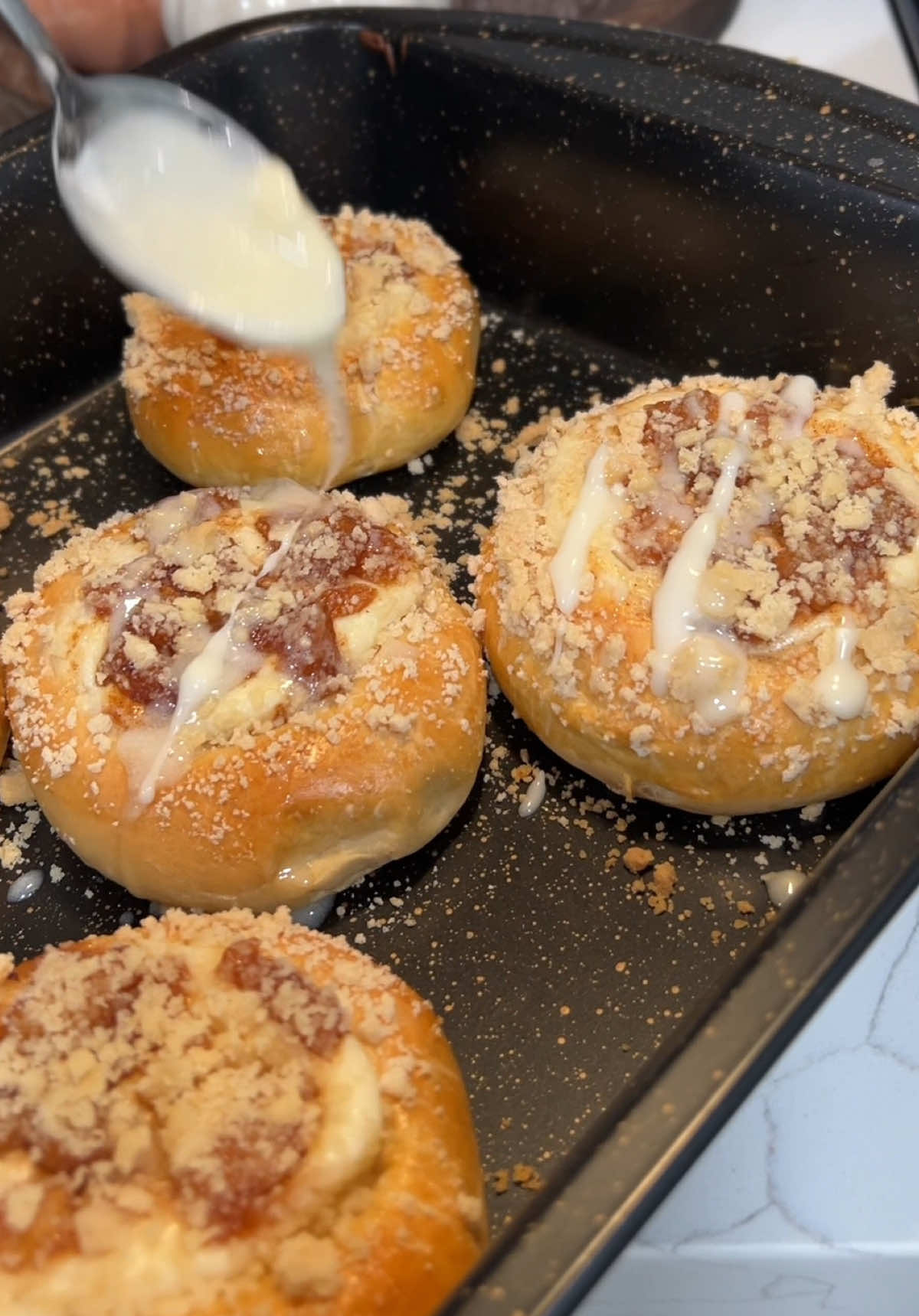 I’m falling inlove with fall baking 🤭 these apply crumble buns smelled and taste so good ! 🍏🍁🍂 Ingredients:  dough - 11/2 cups warm milk - 2 teaspoons active dry yeast - 3 tablespoons sugar - 4 cups all-purpose flour - 1 teaspoon salt - 1/4 cup unsalted butter, melted - 1 large egg cheesecake filling: 1 pack cream cheese - 1/2 cup powdered sugar - 2 tablespoons sour cream - 1 teaspoon vanilla extract - 1 1/2 tbs lime juice - 3 tbs  heavy cream Apple topping  3 sliced apple  1 cup sugar  - 1/4 vanilla essence - 1/4 cinnamon powder 1 tsp corn starch  Crumble   Half cup flour  3 tbs white sugar  1/2 cups melted butter  Mixed until flour breaks like crumbs. #fyp  #fallbaking #fallbakingideas  #CapCut 