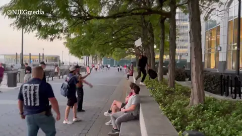 At a memorial for Charlie Kirk in Jersey City, N.J., a leftist counterprotester tried to disrupt it by holding a sign reading, 