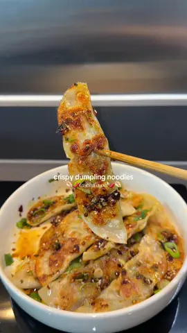 WOW I am obsessed with these!! I love dumplings and noodles and this was the perfect mix of both 🥹 so crispy and juicyyyy 🥟 Used my chicken dumpling recipe in my ebook and here 👇🏽 Filling: - 6 boneless, skinless chicken thighs (approx. 600g) or 600g minced chicken - 12 cloves garlic, crushed - 3 TBSP coriander, finely chopped - 5 TBSP spring onion finely chopped - 2 tsp grated ginger - 1 TBSP sesame oil - 2 TBSP soy sauce - 3 TBSP oyster sauce - 1 tsp white sugar - 1 egg - 40-50 dumpling or gyoza wrappers - 1 tsp cornflour + 5 tsp water - 1 + 1 TBSP oil - 70ml water #dumplings #Recipe #halal #noodles 