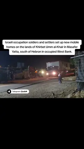 Israeli occupation soldiers and settlers set up new mobile homes on the lands of Khirbet Umm al-Khair in Masafer Yatta, south of Hebron in occupied West Bank.