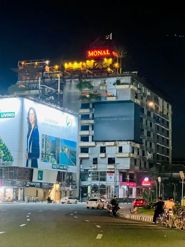 🌃 Monal Lahore Night View 🌃 The heart of Lahore shines brighter at night ✨🏙️ Monal Restaurant glowing on the skyline 🌟🍽️ A perfect blend of lights, food, and unforgettable vibes ❤️ #MonalLahore #LahoreNights #CityOfLights #viral #foryou 