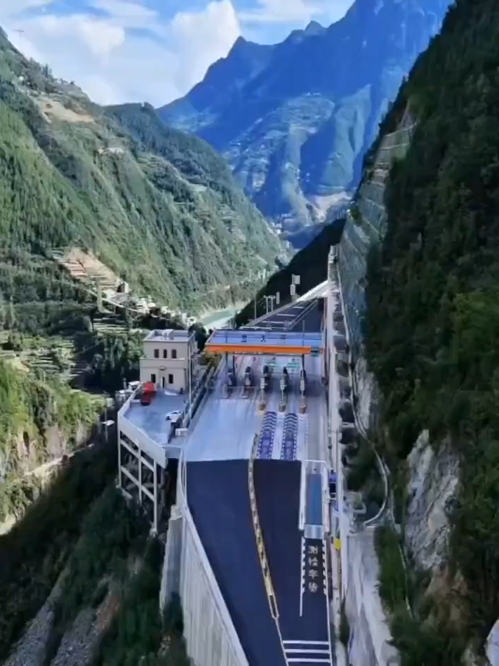 China’s carving highways into mountains. No terrain is too tough when it’s for the people.