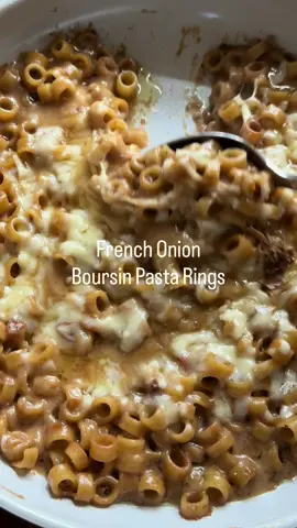 French Onion Boursin Pasta Rings If you liked our last French Onion Pasta you’re going to love this one maybe even more. It’s the same basic recipe but we switched the heavy cream and parm with  caramelized onion flavored Boursin. It’s out of this world decadent and delicious and it’s perfect for a cozy fall dinner.  1/4 c butter divided 1/2 lb ditalini or rings 1/2 c white wine 2 or more cups beef broth 1 can French onion soup Salt and pepper Boursin caramelized onion & herbs 1 c grated Gruyere Heat 2 tablespoons butter in a large skillet. When butter melts add the ditalini and brown it a few minutes. Add the wine and let it evaporate. Start adding the first c of broth a little at a time. Let cook for about 5 minutes. Add the French onion soup and stir it in with the other c of broth. Cover and let it simmer for another 5-7 minutes until tender. Remove lid add the remaining butter and Boursin. If it’s too dry add more broth or water. Season with salt and pepper. Top with Gruyère and cover again until the cheese has melted. • #frenchonion #frenchonionsoup #pasta #caramelizedonions #onions    