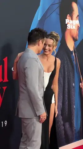 Co-stars Margot Robbie and Colin Farrell pose together on the 