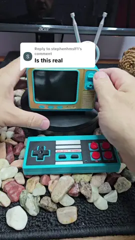 Replying to @stephenhmslf1 It's definitely real. 300+ classic games from the 80s and 90s... it's sick. It plugs into your real TV too if you want the bigger screen. #retrogaming #tiktokshopfinds #90s #80s #nostalgia 