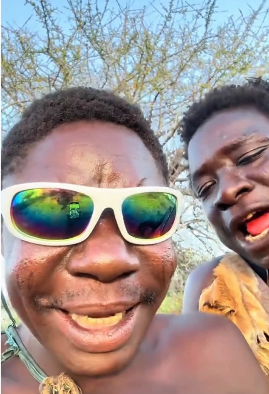Dudukwe sees himself in sunglasses for the first time 😂👀 #hadzabe #foyou #fpy #africantribe #viral_video 