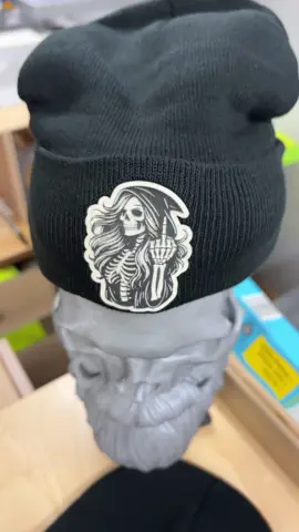 Now available in knit beanies! Leatherette patches are custom laser engraved and permanently affixed using a heat press. Hats are popular Richardson 112 trucker style with adjustable SnapBack closure. We also carry Evolve ponytail hats, FlexFit, and Flat Bill. Check out our TikTok shop for more styles and designs!  #tiktokshop #beanie #halloween #grimreaper 