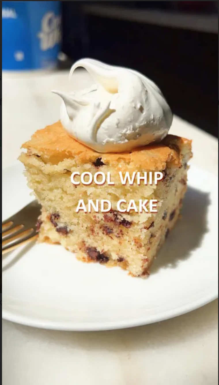 It’s a Cool Whip throwback and also a recipe for chocolate chip snacking cake. Recipe is below or you can grab it on my site jessiesheehanbakes.com 1 cup mini chocolate chips 2 cups 1 tbsp all-purpose flour, divided 2 teaspoons baking powder 1 tsp salt 3/4 cup oil 1 cup granulated sugar 3/4 cup dark brown sugar 2 large eggs 1 tbsp pure vanilla extract 1 cup full-fat sour cream Turbinado sugar for sprinkling Dollops of cool whip for serving, not optional Preheat the oven to 350 degrees. Lightly spray an 8-by-8-inch pan with cooking spray.  Cover the bottom of the pan with parchment paper. Spray the parchment paper. Place the mini chocolate chips in small bowl and lightly spray them with cooking spray. Toss them with 1 tablespoon of the all-purpose flour until covered, and place in the freezer. Whisk the 2 cups of flour, baking powder, and salt in a medium-sized bowl, and set aside. Place the oil and sugars in a large bowl and whisk until thoroughly combined. Add the eggs and vanilla and whisk again, add the sour cream and whisk a final time. With a rubber spatula, gently fold the dry mixture into the wet, until a few streaks of flour remain.. Fold about 3/4 of the frozen chocolate chips into the batter.  Transfer the batter to the prepared pan and sprinkle the remaining chips and the Turbinado sugar over the top.  Place the pan in the oven and bake for 50 to 55 minutes, rotating the pan after 25, and checking on the cake after 45.  The cake is ready when a toothpick inserted in the center comes out with a moist crumb or two.  #easydessert #desserts #caketok 