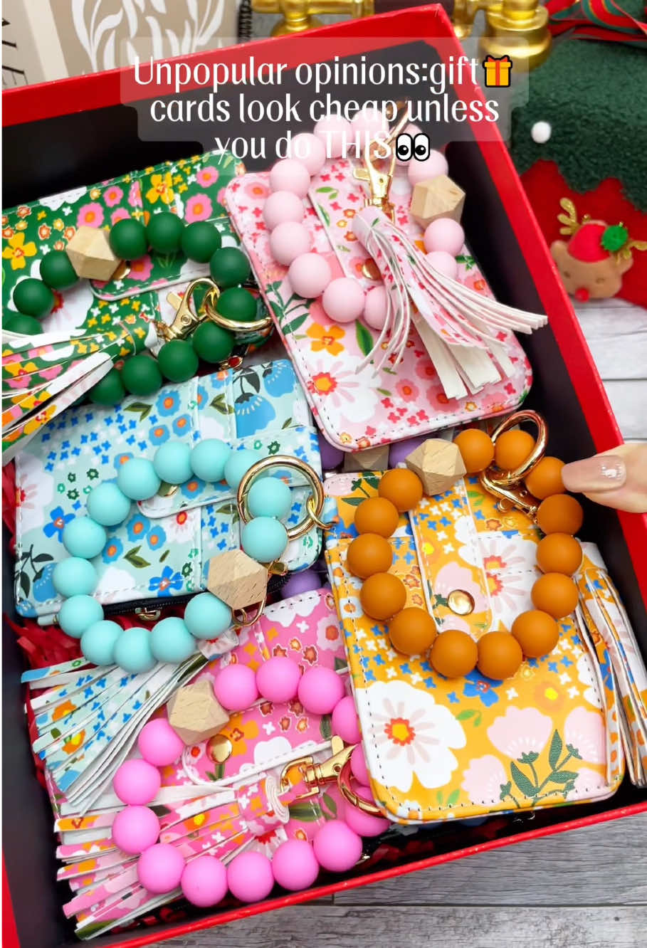 Skip the boring holiday gifts - this wristlet keychain wallet is practical, stylish, and just the right size to slip in a gift card for that extra thank-you. Perfect for teachers, coworkers, or anyone on your list. #HolidayGiftIdeas #KeychainWallet #TeacherGiftIdea #GiftCardHolder #EverydayEssential 