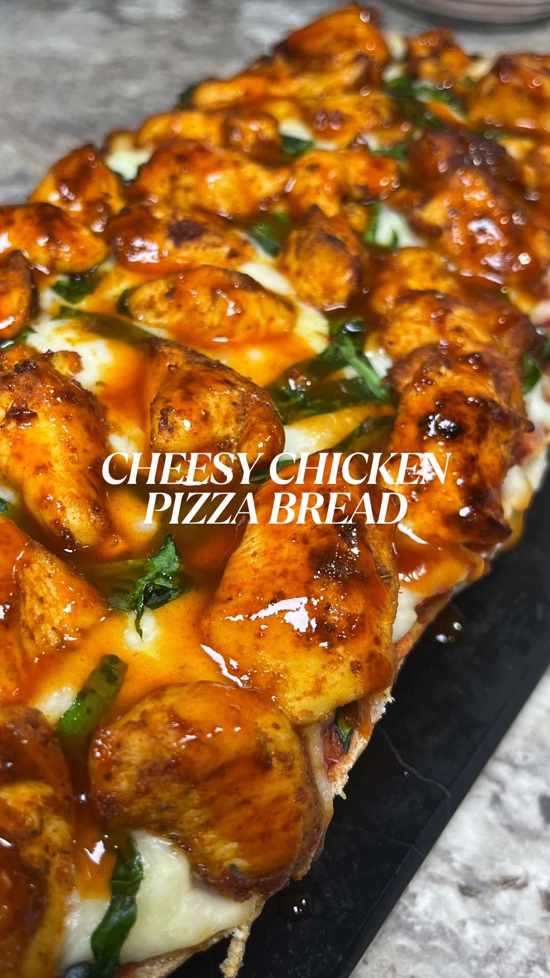 This Cheesy Chicken Pizza Bread I made is A MUST TRY!  Ingredients:  -Italian bread -Mozarella Cheese -Spinach Chicken seasoning: -Smoked paprika  -Old bay  -Onion powder  -Garlic powder  -Oregano leaves -Oil Pizza sauce: -Tomato puree -Barbecue sauce -Ketchup  Garnishing: -Hot sauce -Honey #pizza #fyp #cheesybread #tasty #dinner 