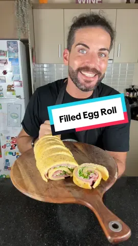 Filled Egg Roll | Perfect for Breakfast, Lunch & Dinner 🍳🌯 This light and fluffy baked egg roll is endlessly versatile — fill it with ham, cheese, and rocket like I did, or get creative with your own combinations. Slice it up for a quick breakfast, a tasty lunchbox idea, or even a fun dinner! Ingredients: 	•	8 eggs 	•	150g ham 	•	Handful of cheese 	•	Handful of baby rocket 	•	2 pinches of salt Instructions: Beat eggs with salt. Pour onto a baking paper–lined tray and bake at 170°C for 7–8 minutes. Cool slightly, flip onto cling wrap, and add ham, cheese, and rocket. Roll tightly using the wrap, refrigerate 1 hour to set. Slice into thick rounds and enjoy warm or cold. Full recipe and more Italian favourites 👉 www.cookingwithtucci.com #cookingwithtucci #eggroll #easymeals #italiankitchen #quicklunchideas     