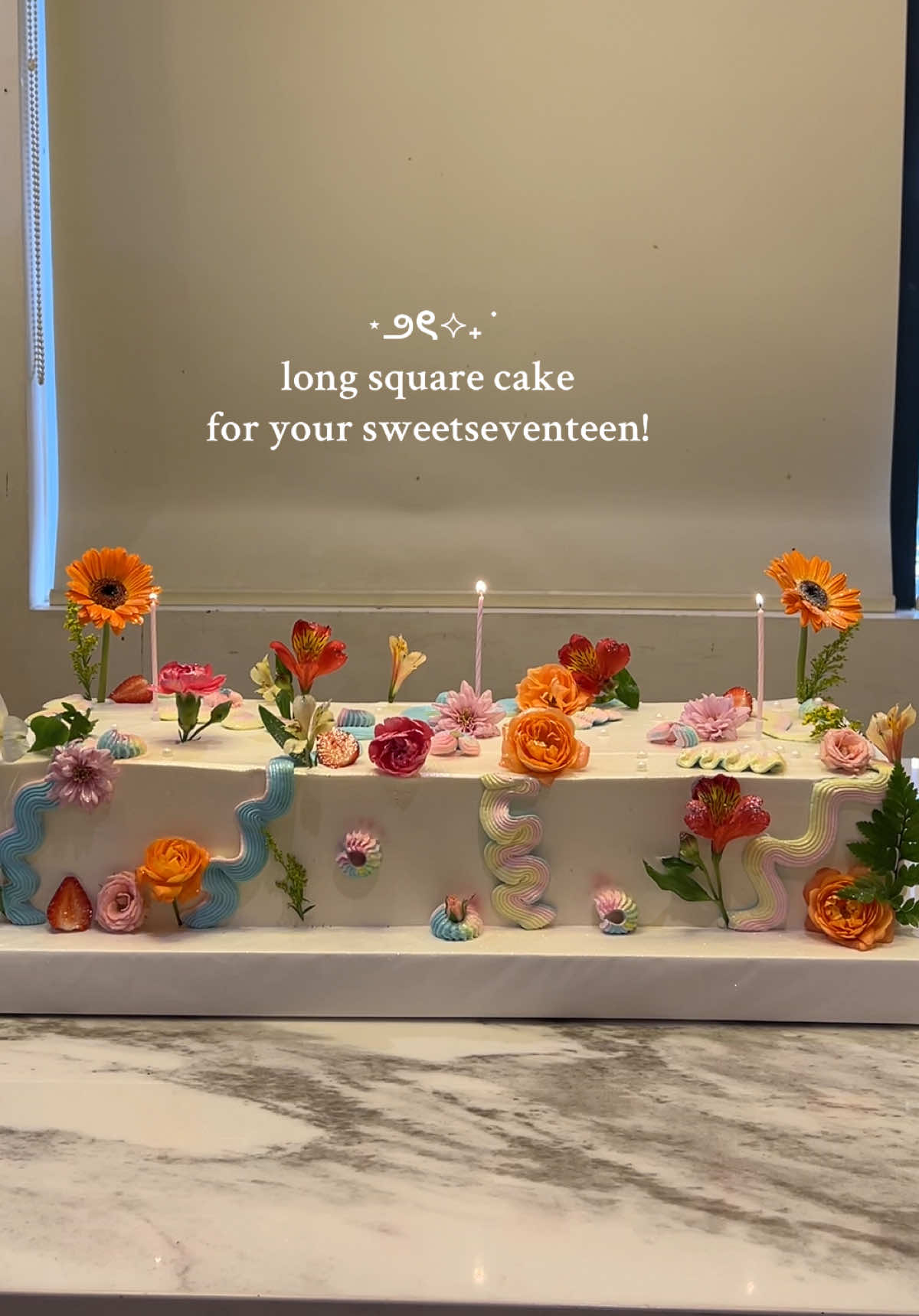 — Square cakes are definitely worth the hype, especially for your big moments! This elegant white cake is all that you need with just the right amount of color from the cream and fresh flowers it become super gorgeous 😍🌸 Choose the perfect custom cake for your speciak occasions,  tap the link in our bio to order! 🛒 #sweetseventeencake #customcskebandung #customcakecimahi  #TheDeliBakes #TheDeliStudio