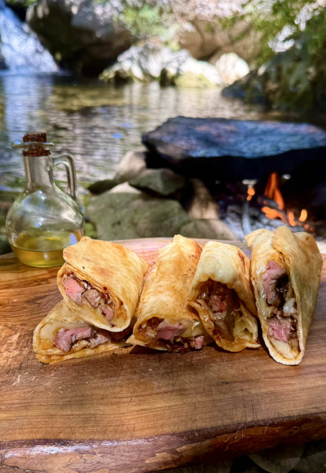 Spicy steak wrap 🌶️🥩⚔️ • Τορτίγια με μοσχάρι και λάδι τσίλι  #outdoorcooking #campfire #steak #food #fyp 