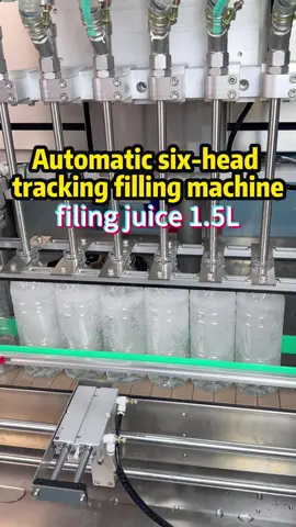 Automatic tracking lifting juice filling machine filling juice 1.5L #tiktok #automaticfillingmachine #fillingmachine #fillingmachinefactory #trackingfillingmachine #juice 