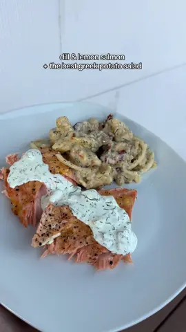 so hectic trying to make a healthy dinner on time before the toddler meltdown happens🤣😭 see full recipe below sorry this video wasn’t the best. Recipe  For Salmon 🐟 1 salmon filet  S & P Lemon  Bake at 400 until 145 degrees 10-15 mins  Potato salad 7 gold Yukon potatoes skinned  1/2 can Kamala olives 🫒 chopped Big handful of sun-dried tomatoes chopped  Lots of dill 1.5 cups Mayo Red wine vinegar little more than 1/4 cup measure of vibes  1/2 cup olive oil some oil from sun-dried tomatoes  Generous amount of garlic powder  S &P Oregano Splash of mustard  One finely chopped sweet onion 🧅  Feel free to add more mayo can be very acidicy with the vinegar  Dill greek yogurt sauce  1 cup greek yogurt  ~1/2 mayo Diced pickles about a handful Lots of chopped dill 1&1/2 lemon 🍋 juice  #dinnerwithme #DinnerIdeas #mediterraneanfood 