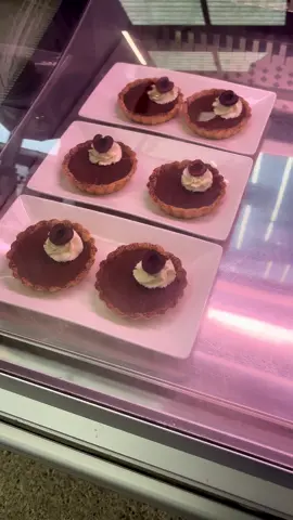 All set up and ready to go! ✨ Come say hi—we’re at The Farmyard Market today until 1pm! What’s on the menu… • Raspberry panna cotta 🍮 • Chocolate tarts 🍫 • Black Forest cake 🍒 • Malteser cheesecake 🍫 • Tiramisu ☕️ • Mars bar brownie 🍫 • Cadbury caramel cookie pie ✨🍪 • S’more’s cookie bar ☁️🍪 • Rolo cookies 🍪 • Bakewell tarts 🍒 • Kinder stuffed cookies 🌰🍪 Support local and enjoy a great day out! 💜 #Cornwalltiktok #Truro #Cornwall #Farmersmarket #supportsmallbusinesses  