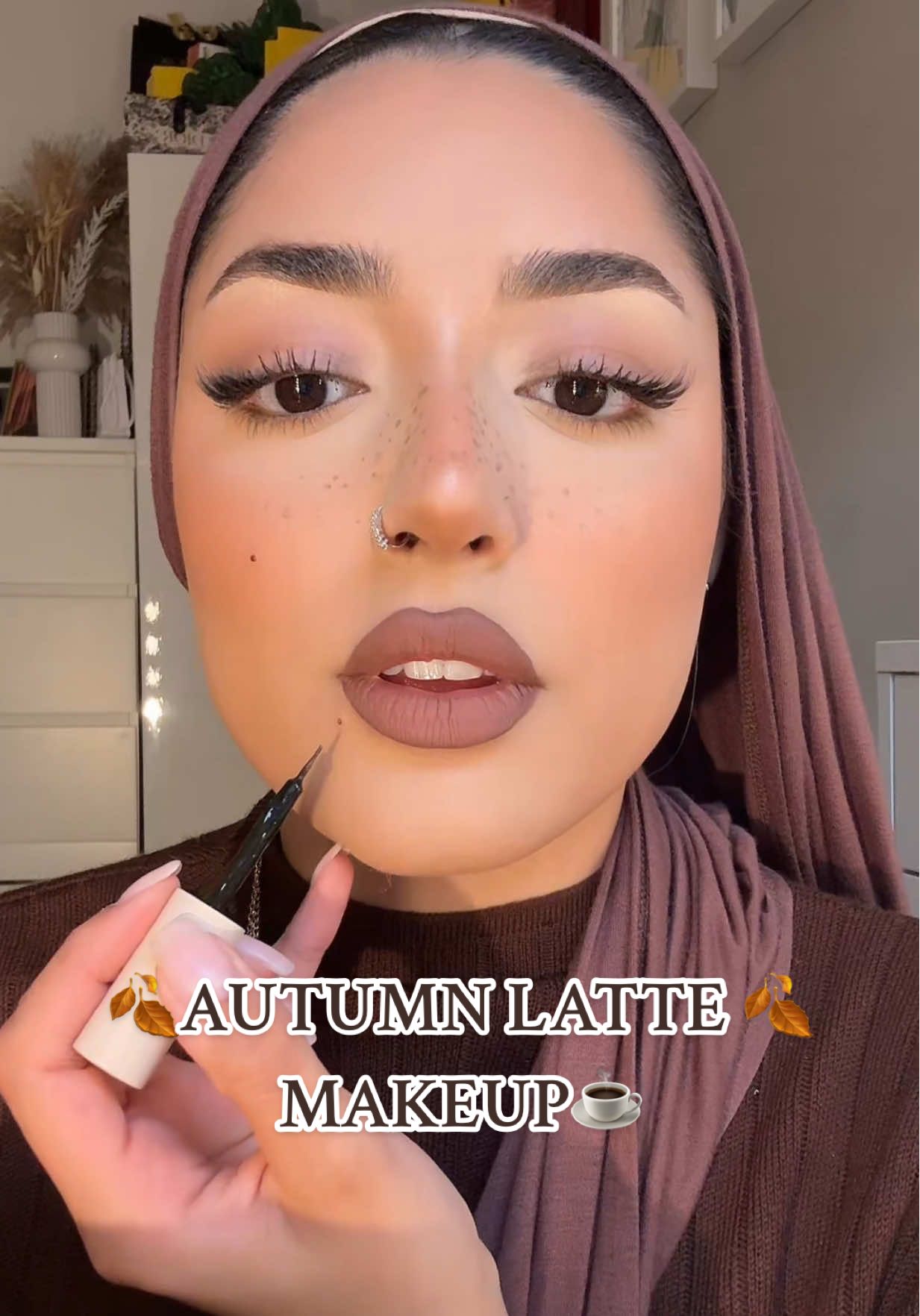 my take on latte makeup ☕️ my fave season is finally here! 🍂  @YSL Beauty glow foundation  @Hourglass Cosmetics concealer  @Huda Beauty blonzer shade “latte”/ lip tint liner “toasty brown” @NARS Cosmetics powder blush  @Huda baking powder  “poundcake” @Kylie Cosmetics brown mascara / lip kit shade “dolce k” @SHEGLAM freckle tint  #fyp #makeup #lattemakeup #grwm #browngirl