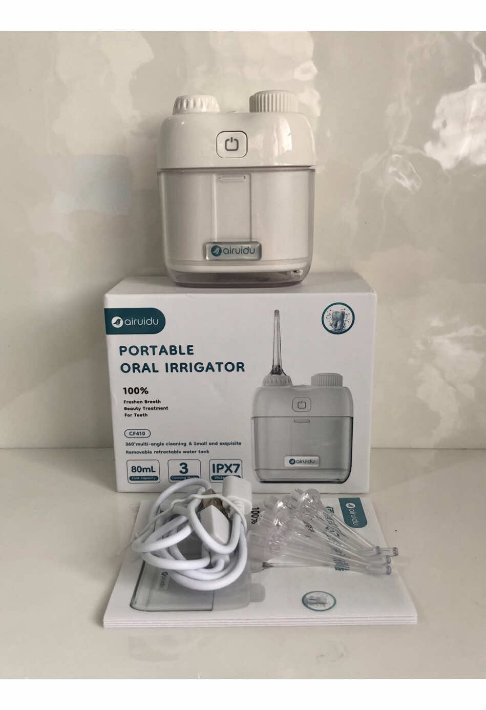 🦷 Smile brighter, anywhere! 🦷 This travel-size water flosser packs powerful oral care in your pocket! With IPX7 waterproof tech, 3 modes, and 4 nozzles, it removes food debris and plaque even on the go. Fresh, confident smiles anytime, anywhere! 💧😁 @AIRUIDU Philippines #airuidu #airuiduwaterflosser #airuiduflosser #miniwaterflosser #portableoralirrigator 