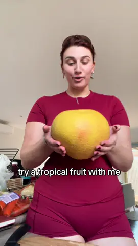 I love trying new foods, but this.. am I doing it right?  #pomelo #tropical 