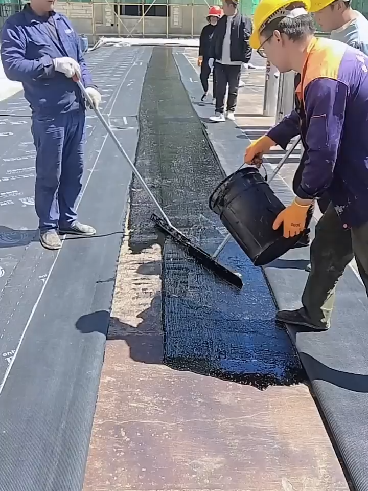 scraping and applying the heated waterproof coating