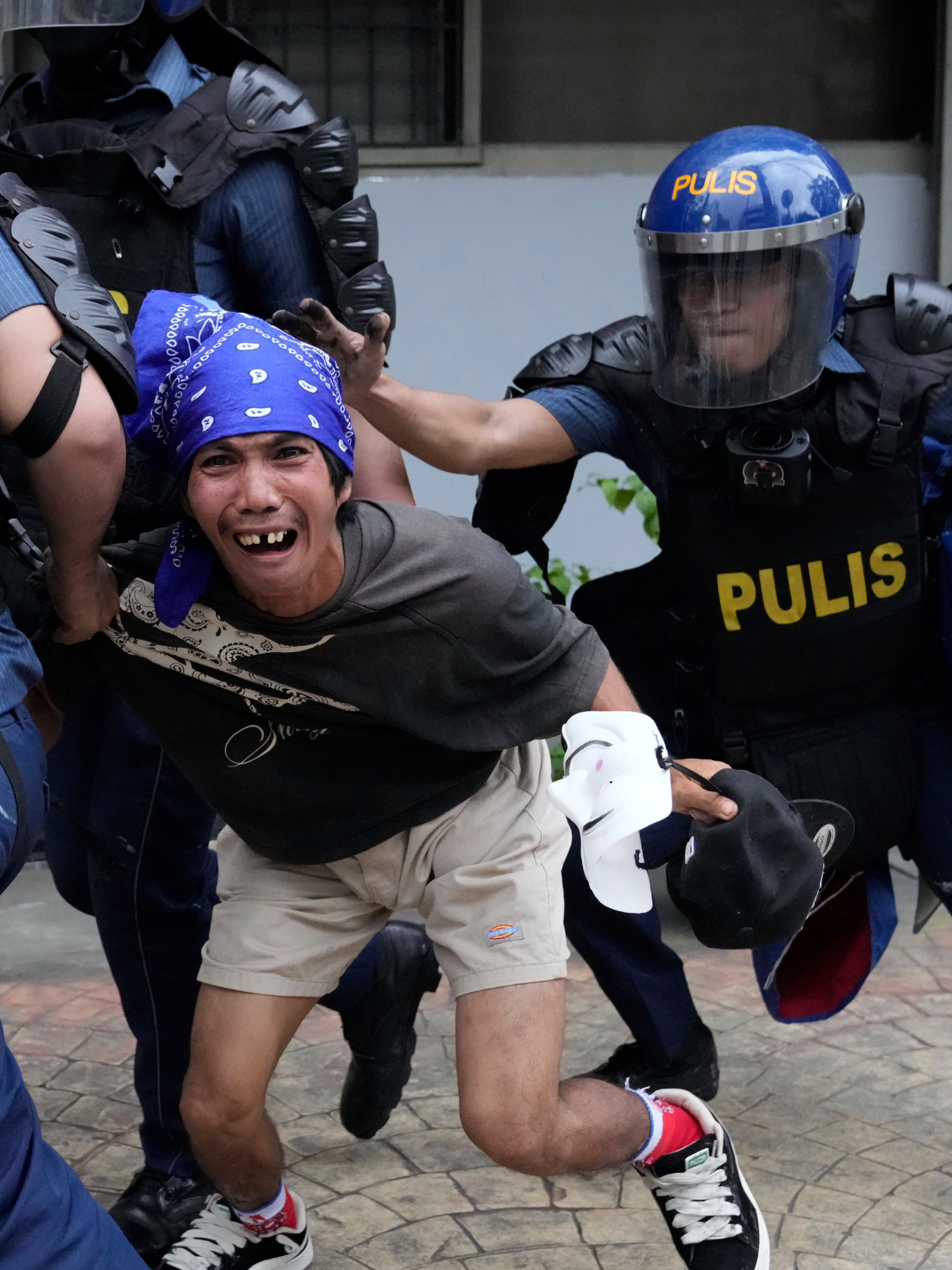 Youths and police square off near presidential palace in the Philippines as corruption protests continue