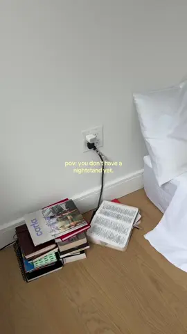 two stacks of regular sized books and  a small stack of magazines for the top of the “table” #apartmentdecor #apartment #apartmentupdates #design #nighstand 