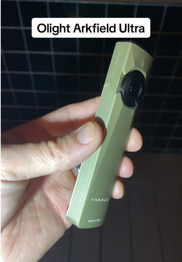Olight Arkfield Ultra with a BRIGHT flashlight, a crazy strong green laser, and a UV light. #olight #flashlight #uvlight #laser 