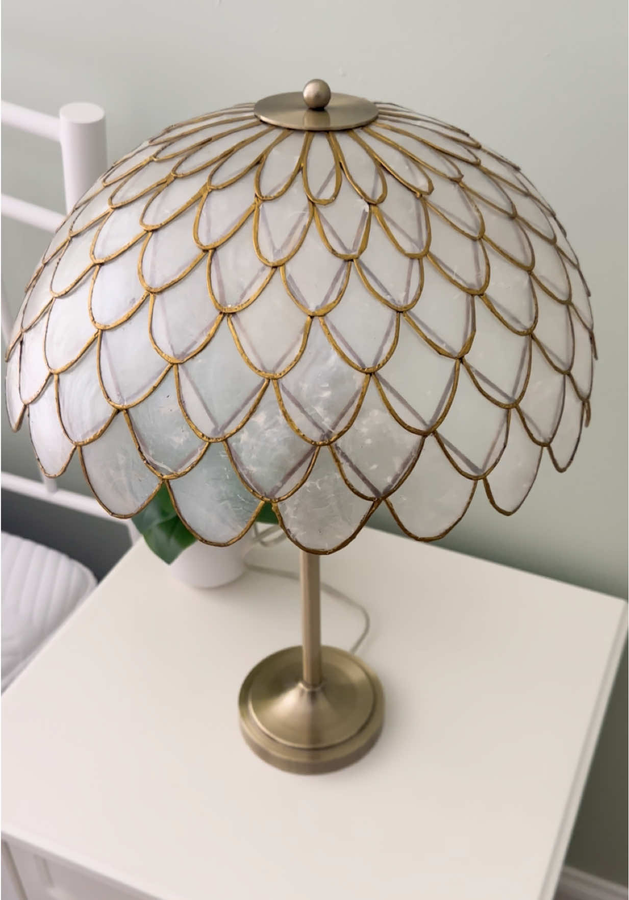 Gold Scallop Capiz Table Lamp Pottery Barn Teen This lamp is absolutely gorgeous!! It may be low in quantity but there are so many other beautiful options from Pottery Barn Teen. Check out my LTK Link in Bio ⬇ https://liketk.it/5oKuF @Pottery Barn Teen #tablelamp #bedsidetablelamp #lamp #potterybarnteen #potterybarn 