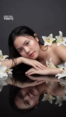 GEMINI AI 🌷🤍 Prompt: A dreamy portrait of a beautiful woman lying gracefully beside white lilies, her head resting gently on her arms, is reflected perfectly on a glossy black surface. Soft cinematic lighting highlights her glowing skin and delicate facial features, with wet strands of hair framing her face, and wearing white tube. The mood is ethereal, romantic, and artistic, with a serene atmosphere, ultra-realistic, high-detail, professional studio photography, 8K. #geminiai #geminiaiprompt #viraltiktok #trending 