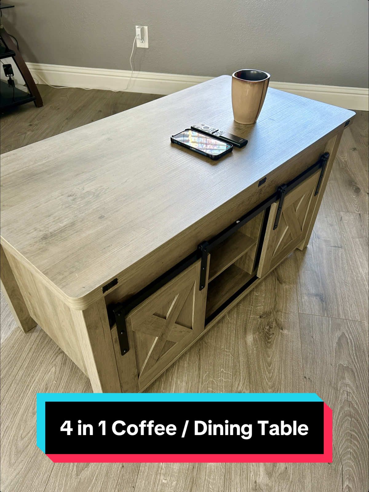 Transform your living room with this 4-in-1 farmhouse coffee table! 🚪✨ Lift-top design converts easily into a dining table, with hidden storage and sliding barn doors for extra space. Perfect for small spaces and modern farmhouse vibes. #HomeDecor #FurnitureFinds #FarmhouseStyle #SpaceSaver #TikTokShopCreatorPICKS 