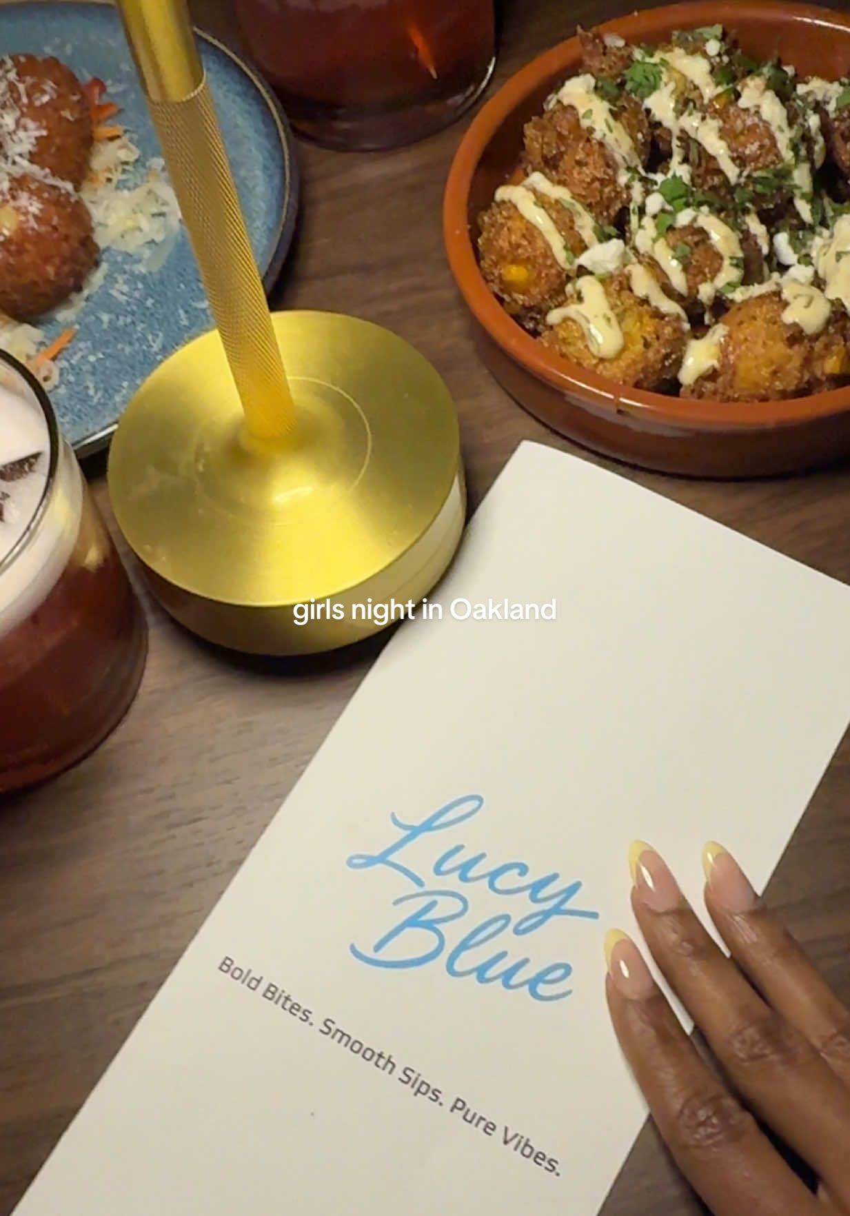 The elote hushpuppies are calling my name 💙 Girls night at Lucy Blue in Oakland  #bayarea #girlsnight #girldinner #oakland 