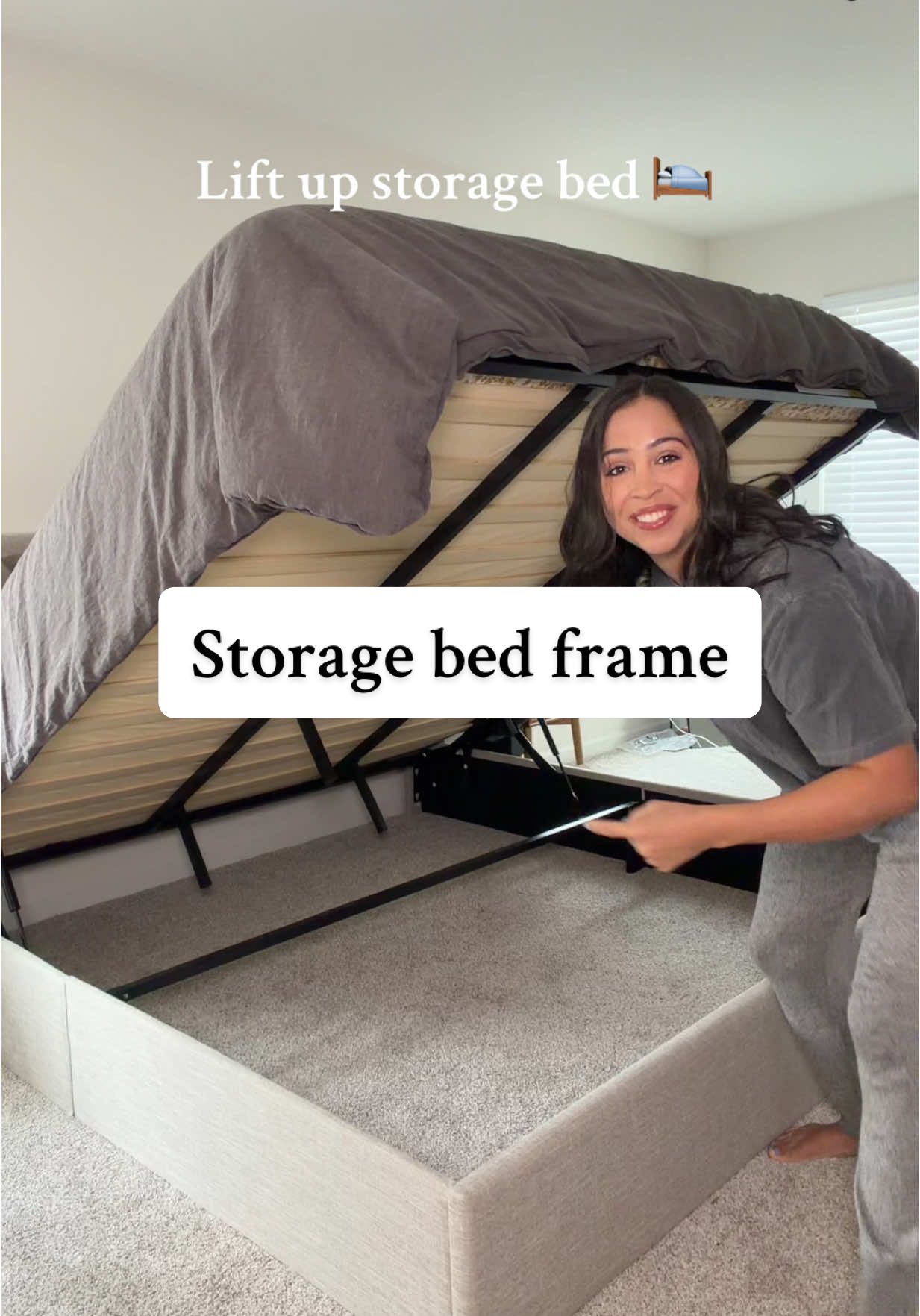 This upholstered storage bed is genius for small spaces or spaces low on closet space. So much can fit under there and it’s easy to lift with the hydrology system! #storagebed #upholsteredbed #storagehack #tiktokshopfalldealsforyou 