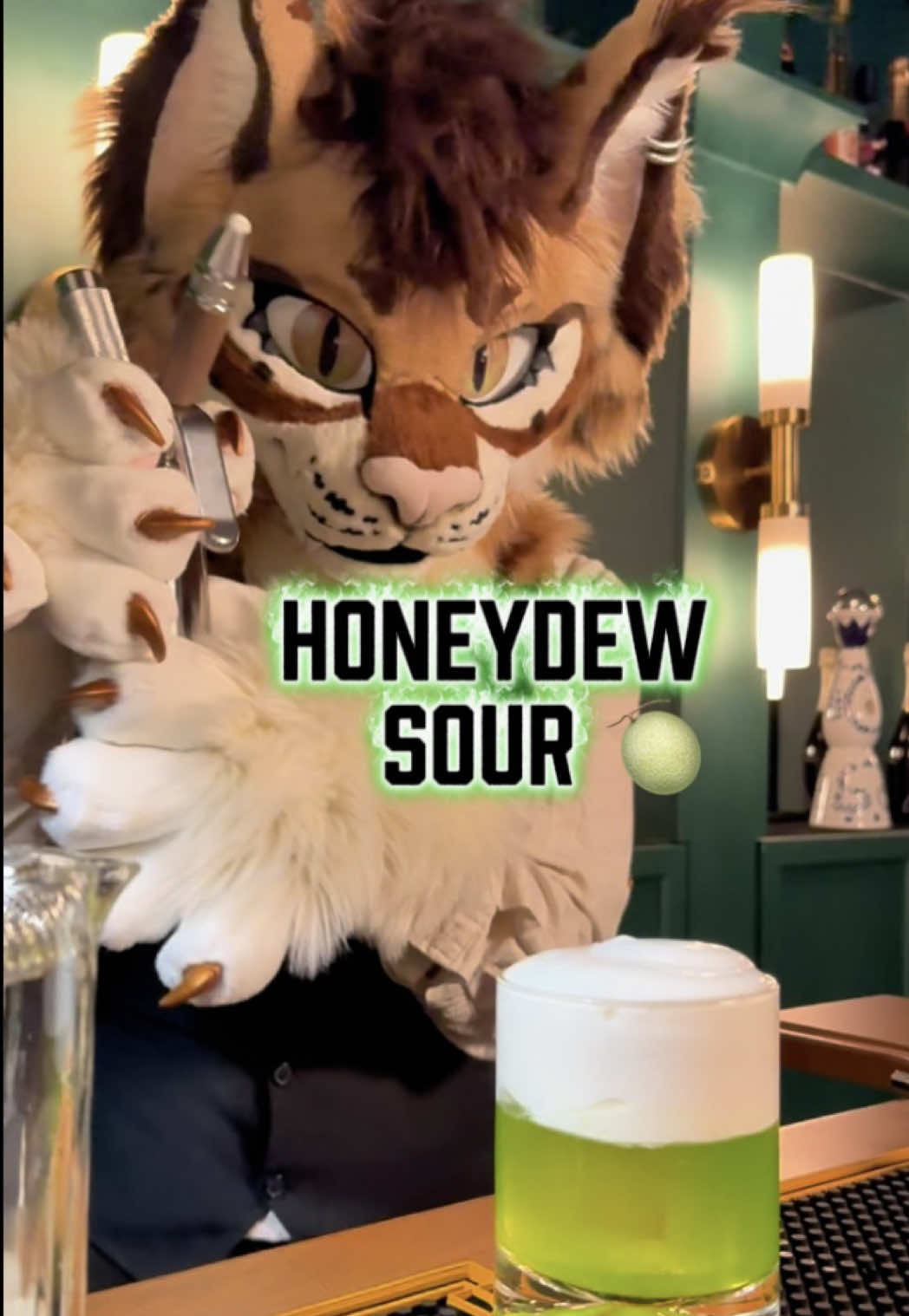 Today on Lynx Drinks - The Honeydew Sour 🍈 I’m so excited to use my @nitro.press more for creative cocktails! This take on a Midori Sour uses a stabilized foam to provide a nuanced texture, along with a very interesting sip!  Recipe (21+): Base -  1.5 oz Midori 0.5 oz Lime Juice  0.25 oz Honey Syrup  Foam - (I’ll make a video on this) 0.5 oz Honey Syrup  0.5 oz Lime Juice  1 oz Coconut Rum (Hard Truth or Malibu) 1/8 tsp Methylcellulose  1 pinch Xanthan Gum 2 N2O Charges  . . . #furry #mixology #bartending #cocktails #lynxdrinks 