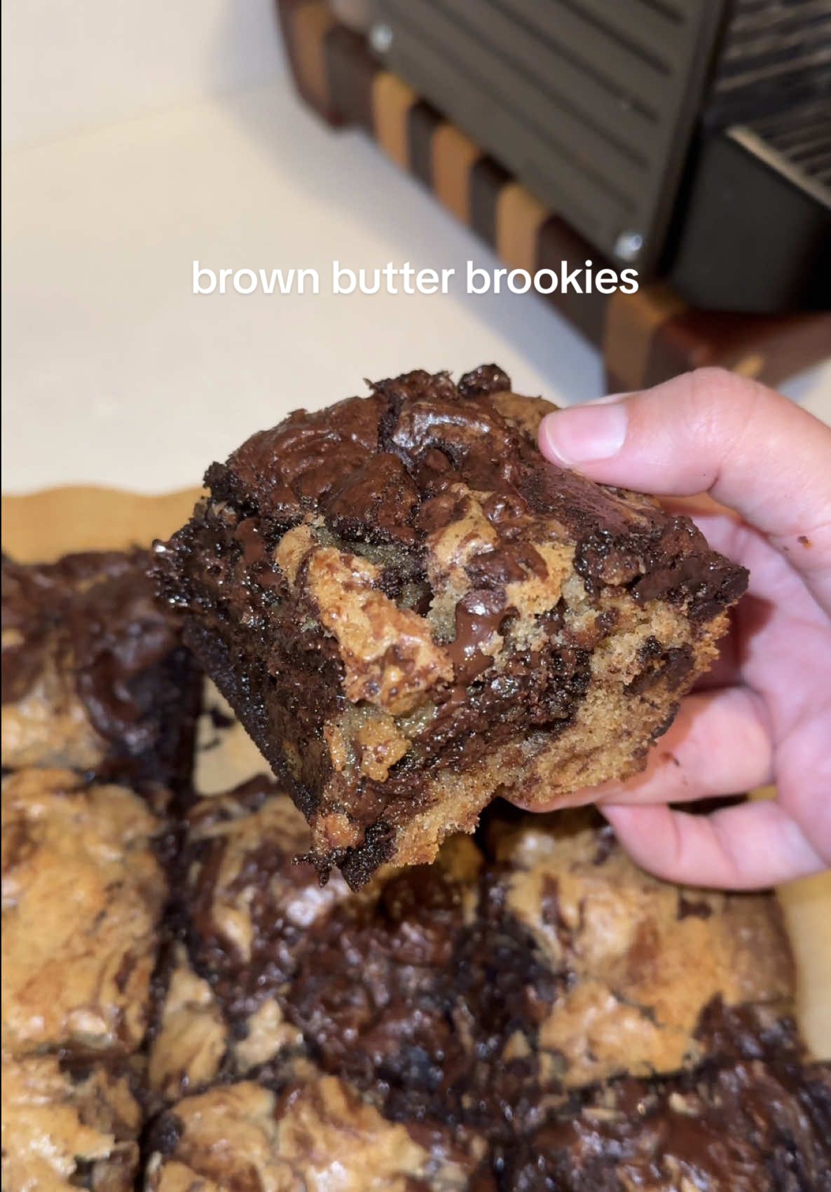 BROWN BUTTER BROOKIES this is such a fun trend but idk who started it. inspo from sugarspundreams and chef smiley recipe: ingredients brown butter: 339g (or 1 1/2 cup) butter (unsalted brownies: 130g (or 1 4oz bar) chocolate (chopped, I used 60% dark) 75g (or 3/4 cup + 1 tbsp) Dutch processed cocoa powder dash of vanilla extract or paste 325g (or 1 3/4 cup packed) light brown sugar 3 large eggs (room temp) 115g (or 3/4 cup + 2 tbsp) all-purpose flour pinch of salt 85g (or 1/2 cup) chocolate chips (I used semi-sweet) chocolate chip cookies: 60g (or 1/4 cup) granulated sugar 140g (or 3/4 cup) brown sugar 2 large eggs (room temp) 1 tsp vanilla extract/paste 190g (or 1 1/4 cup) all-purpose flour  1 tsp baking powder  1/4 tsp salt 1/2 tsp espresso powder (optional but enhances the chocolate really nicely) 100g (or 1/2 cup) chocolate chips directions for brownies: preheat your over to 350F (180C). brown your butter separate to 2 bowls, leaving one to cool. Add to the hot one your chopped chocolate. mix until melted. add your cocoa powder and vanilla extract and mix until fully combined and set aside. in a separate large bowl, combine your brown sugar and eggs and whisk until light in color and fluffy. This may take a few minutes (3 to 4 by hand, about 2 mins with an electric mixer). pour in your chocolate and brown butter mixture and mix until combined. add flour and salt and fold with a rubber spatula until flour is nearly mixed in. just mix until most of the flours mixed in. add chocolate if desired and fold to evenly distribute. set aside.  directions for cookies: once brown butter is cooled, combine with brown and white sugars and mix. add your egg and mix for a minute or two until the mixture is paler and thicker. add your vanilla and mix to combine. add your dry ingredients, except your chocolate, and fold with a spatula until almost all the flour is mixed in. there should still be a few streaks of flour visible. add your chocolate and mix until no flour remains.  in a parchment lined 8x8 pan, alternate transferring your doughs and allow to bake for 35 to 45 minutes, checking at about 30 minutes with a knife. if it comes out mostly clean, it’s ready to be taken out.  #baking #brownies #brookies #fyp #chocolate 