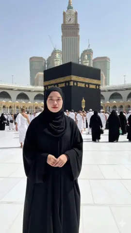 Masya allah, bismillah my dream come true ❤️🕋 Prompt : A beautiful young indonesian muslim woman standing in fronr of the kaaba in masjid al-haram, makkah. she is wearing a full black abaya and hijab with loose sleeves, standing gracefully with both hands folded in front. her expression is calm and serene, with soft natural makeup. behind her is a clear view of the kaaba with gold callography, surrounded by many pilgrims dressed in white ihram and black abayas. in the background, the towering abrah Al-bait clock tower dominates the skyline under a bright white marble, reflecting sunlight. the photo is shot in daylight with high clarity and detail, 9:16 aspect ratio, realistic lighting and clean composition. no text, no, blur, hyperrealistic photography style  #googelgemini #fotogeminiai #editfoto #fyp #capcut 