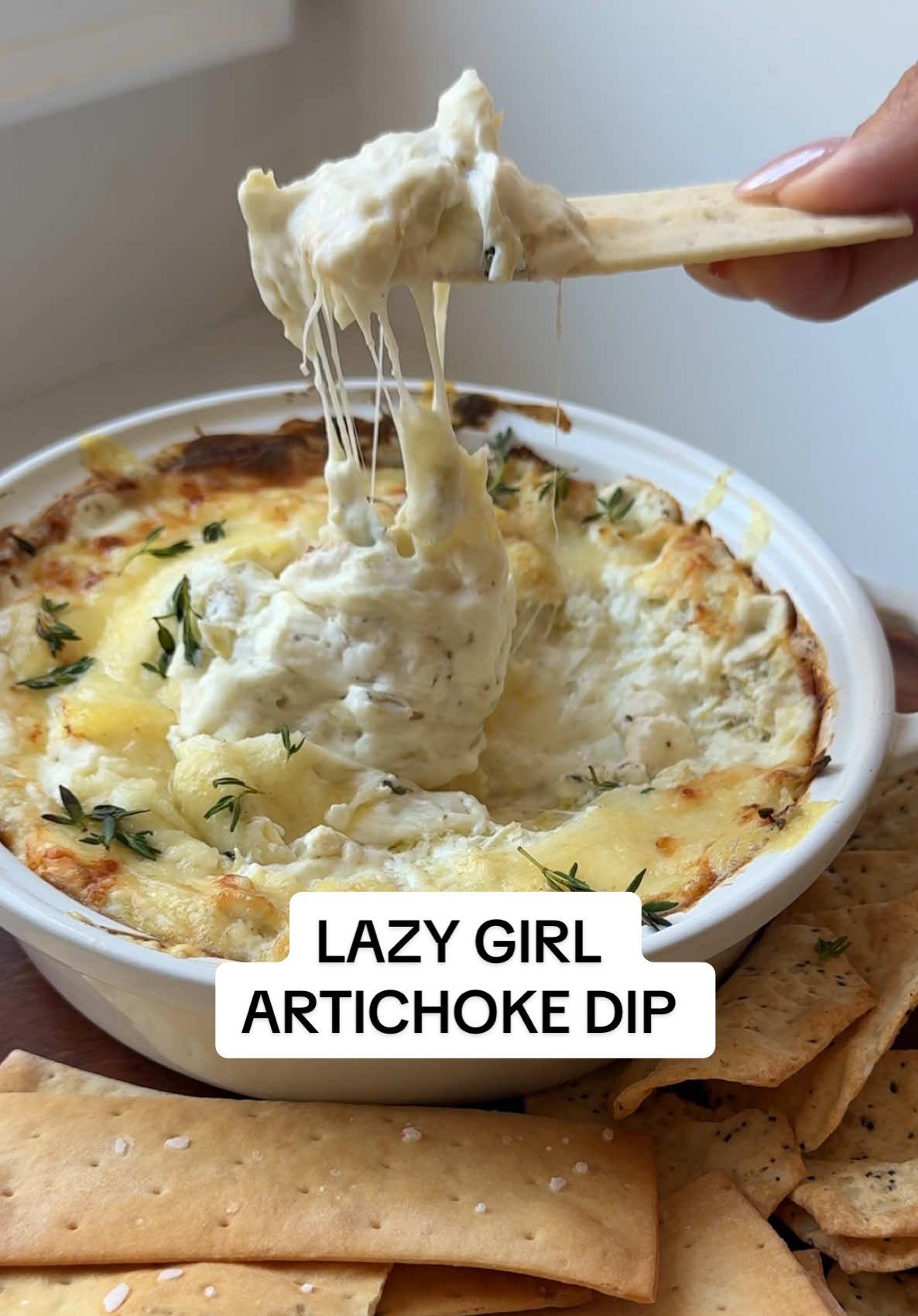 4 ingredients is all you need 👏🏻🧀 Get ready to make the easiest baked cheesy hot dip for any occasion! Whether you are serving this up for game day, a dinner party, date night or going into the holiday season- it will be a hit 😍 What you’ll need: 🧀 cream cheese 🧀 sour cream 🧀 chopped up artichoke hearts 🧀 mozzarella cheese 🧀 salt & pepper 🧀 chopped parsley (optional garnish) Heat your oven to 375F. Mix all your ingredients together and taste test to see how much salt and pepper you’d like to add in for some added flavor. Bake until melty and enjoy with crackers! Optional: for more flavor add in a clove of minced garlic  This can be prepared ahead of time and then just bake whenever you are ready to serve! 🧀 An easy cheesy dip that you will have on repeat🔁🧀😍 #cheesedip #appetizers #recipeshare #cheeselover #artichokedip    