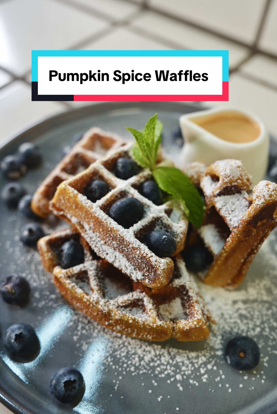 The best Pumpkin Spice Waffles. Everyone will love them! Full Recipe  Pumpkin Spice Sauce : 3/4 cup Heavy Cream  1/4 cream cheese  Warm up in a sauce pan until cream cheese is completely melted.  2 spoonfuls Pumpkin Puree  1/4 cup condensed milk  1/2 tbsp Pumpkin Pie Spice Warm and whisk all together.  Waffles:  Pancake mix  Pumpkin Puree  Condense Milk  Pumpkin Pie Spice  Milk  Toppings:  Powdered Sugar  Blueberries  Mint  Pumpkin Spice Sauce  #EasyRecipes #pumpkinspice #waffles 