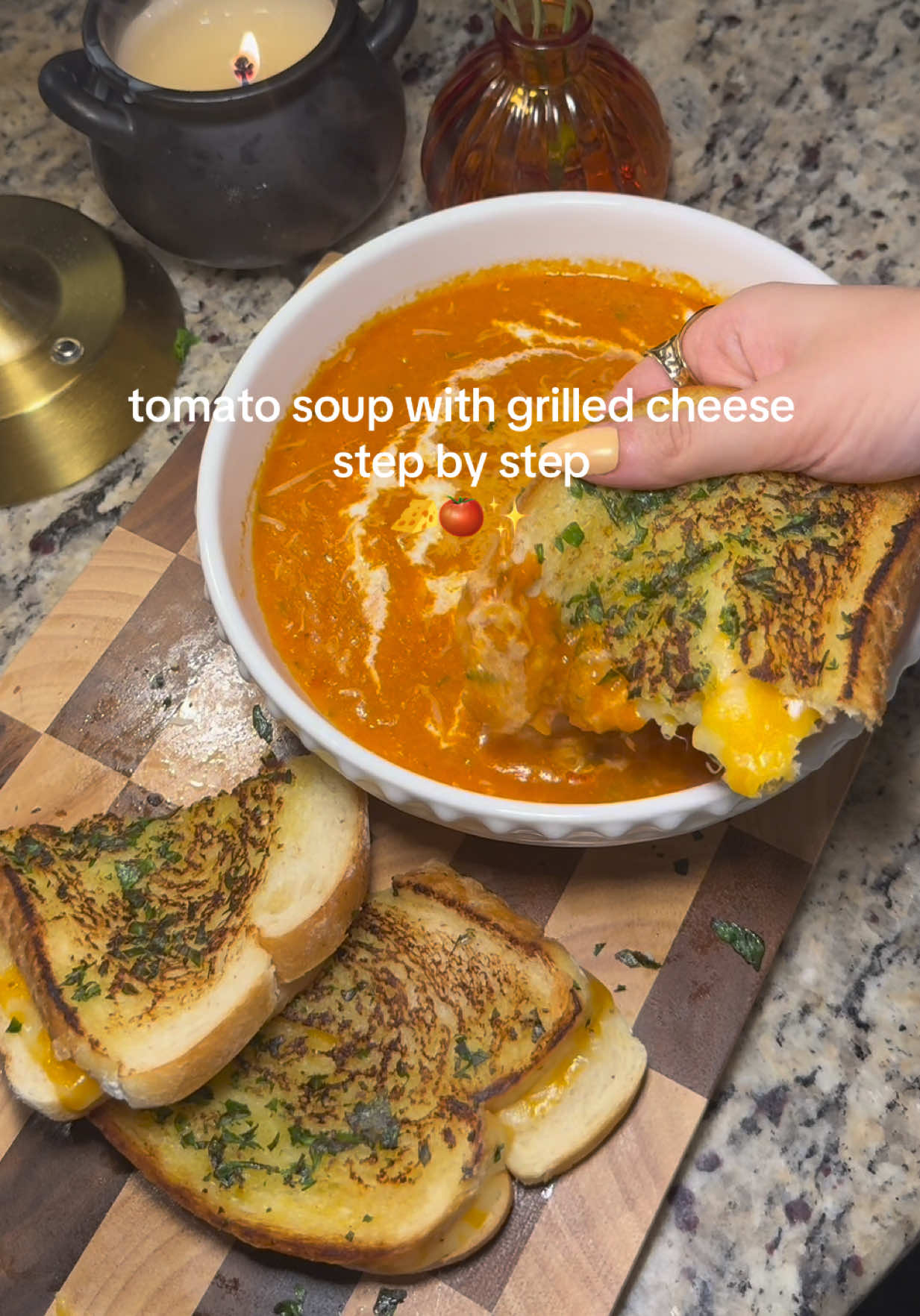 Tomato soup recipe with grilled cheese for 2 !         •      3 garlic heads 	•	Tomatoes 	•	half a large yellow onion 	•	onion powder 	•	garlic powder 	•	chili powder        •     Italian seasoning  	•	1/3 cup olive oil 	 Soup base: 	•	2 cups broth 	•	1 tbsp tomato paste 	•	2 tbsp chopped basil 	•	Onion powder        •     Garlic powder         •     Salt + pepper  	•	Italian seasoning 	•	3 tbsp butter 	•	1/2 cup parmesan 	•	2 tbsp heavy cream Grilled cheese         • artisan bread         • colby jack cheese from deli        • parsley         • butter         • mayo         • minced garlic  This was sooo good I didn’t expect it😍😍 tag me if you make it! #tomatosoup #grilledcheese #soupseason #cozydinner #fallrecipe 