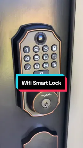 Keyless weatherproof deadbolt with a camera and doorbell.  Unlock your home remotely with the new WiFi deadbolt #smarthome #smartlock #techtok 