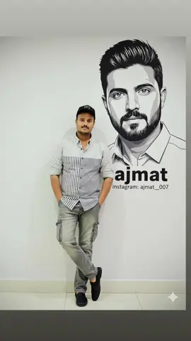 When your art is bigger than life, you just have to strike a pose! Feeling the vibes with this epic mural. 💥 #ArtMeetsReality #india #dubai #fun 
