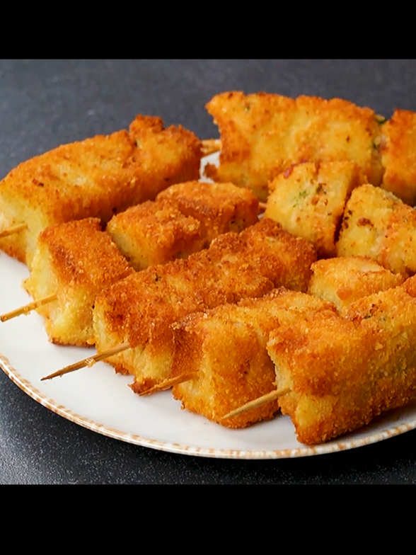 If You Have Leftover Bread & Chicken at Home, You Can Make This Delicious Snacks Recipe Ingredients & Process: 2 Boiled Mashed Potatoes  1/2 Cup Boiled Shredded Chicken  2 Tbsp Onion  1 Green Chilli  1/2 Tsp Salt  1/2 Tsp Coriander Powder Mix Well 1/2 Tsp Chilli Flakes  1/2 Tsp Pepper Powder  1 Tbsp Coriander Leaves  1 Tsp Lemon Juice  Mix Well Bread Piece  Cut The Edges  Bread Pieces  Tomato Sauce  Mayonnaise  Spread Potato Chicken Mixture  Fold Cut As Shown Put In Shashlik Stick Flour Slurry: 1/4 Cup Flour  1/2 Cup Water  Mix Well  Dip In Slurry  Coat With Breadcrumbs Fry In Medium Heated Oil  Fry Both Sides Well . . . #foryoupage #fyp #viral #trending #leftoverbreadrecipe     